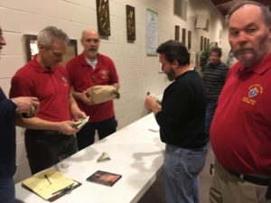 Brother Knights serving patrons and distributing meals during the 3/23/18 event.