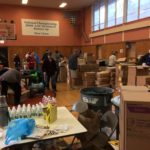 The Saint Mary's Outreach Center shortly before the doors opened the needy started pouring into the gym for their monthly supplies. Brother Knight Jerry Domingue is working at his station in the upper right (he's wearing the beige shirt with plaid stripes).