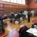 The Saint Mary's Outreach Center utilizes the St. Mary's Catholic School Gym to feed and clothe over a thousand registered families each month.