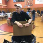 Deputy Grand Knight Joe Ditizio takes a break during water distribution to volunteers.