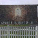 The Knights put up the "Christ is Risen" sign in front of the former Church Pre-School building that serves as their Council Hall.