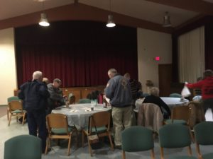 Parishioners get ready to sit down and eat their dinners. By the time the night was done we would have t pull out four more tables. It was a sell out crowd!