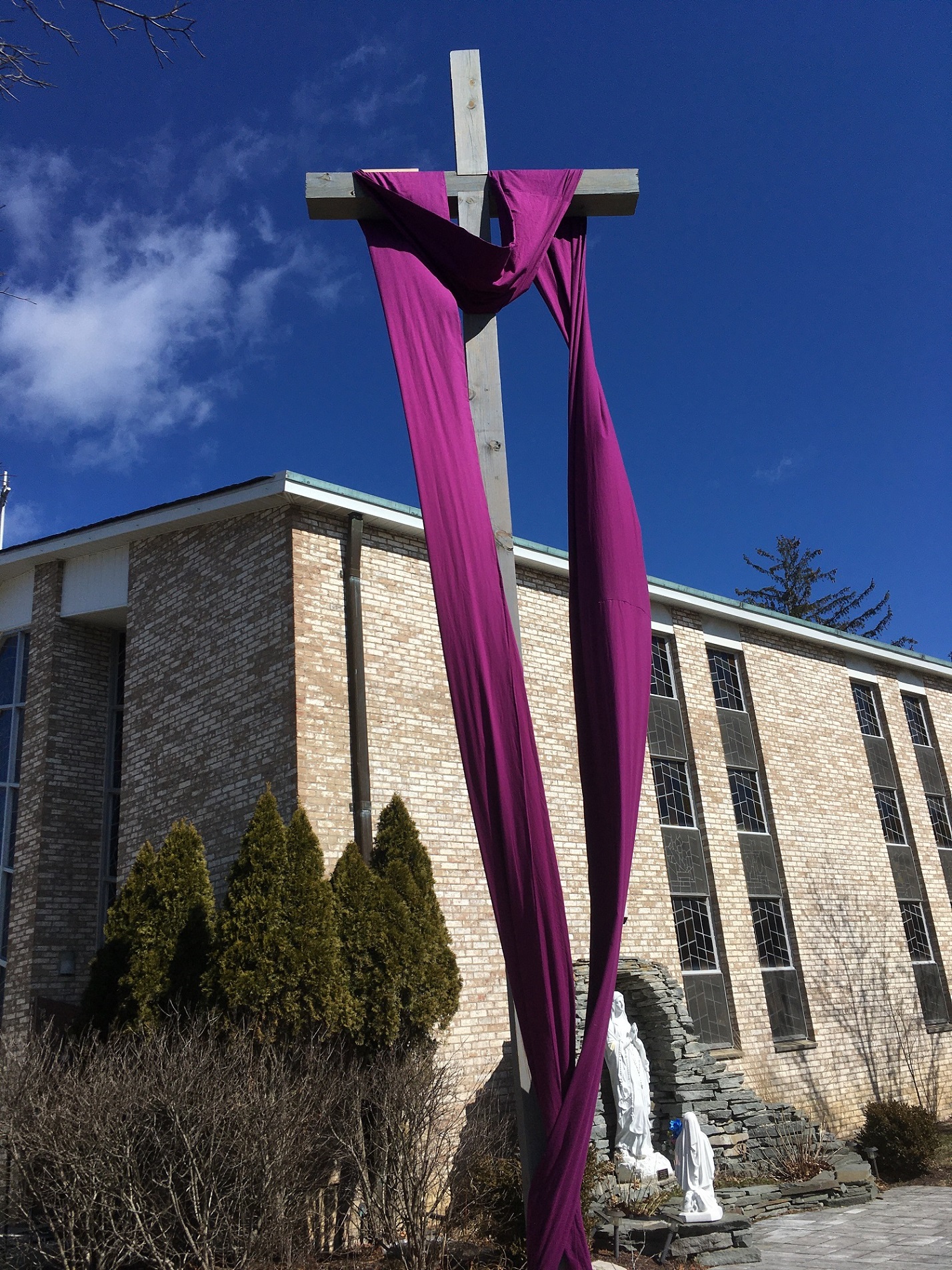 On 3/29/20 the Knights put the purple Lent sash on the Church crucifix.