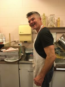 Brother Grand Knight Charlie Cino not only baked fresh bread, but also manned the dish washing station.