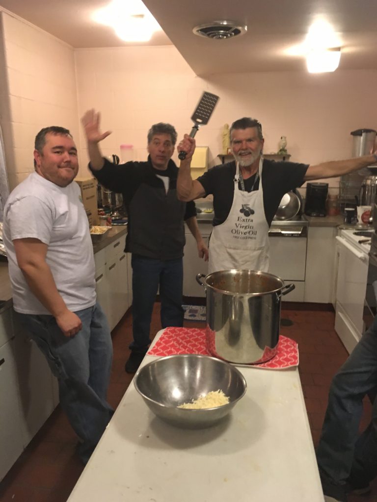 Brother Knights (l to r) Matt Rommel, Billy Ferrara, and Grand Knight Charlie Cino handled cooking and cleaning in the kitchen.